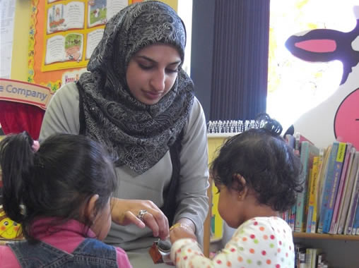Sharing a 'Treasure Basket' at Chaul End Children's Centre