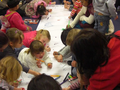 Storytelling session with children and parents from Park Town Pre-School, based on 'The Hungry Caterpillar' at Waterstone's, Luton