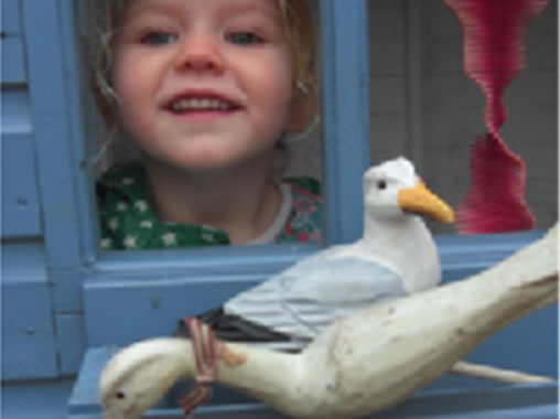 Fun and chat in the 'Beach Hut' at Bizzy Bees Pre School, Bedford